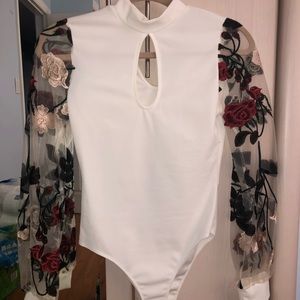 Fashion Nova white with floral sleeves body suit